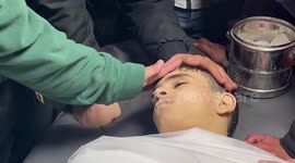 Mourners gather around body of 15-year-old Palestinian killed by Israeli forces