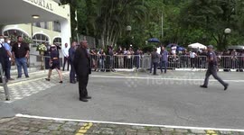 Soccer player Pele's coffin arrives at the cemetery in Santos, Brazil