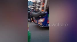 Furious motorists throw punches against each other as onlookers helped separate them in road rage incident