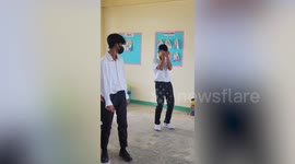 Students fail hilariously at ‘pass the dance step’ Christmas party game