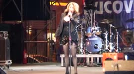 Popstar falls over during concert