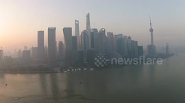 Drone footage of Shanghai skyline under smog