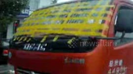 Why would you ever cover your windscreen with masking tape?