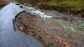 Main road in the Lake District, UK destroyed by Storm Desmond