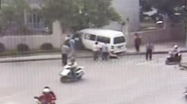 Scooter rider miraculously escapes being run over by out-of-control minibus