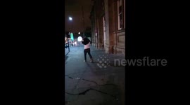 Drunk Geordie tries to put his jacket on