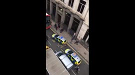 Police swoop on London bus after 'samurai sword' umbrella reports