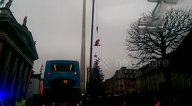 Xmas acrobats on spire o'Connell st