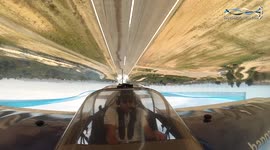 Aerobatic pilot turns plane upside down very close to the ground