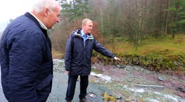 Tim Farron inspects the damaged A591