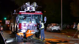 Firetruck being checked out after pulled out of sinkhole