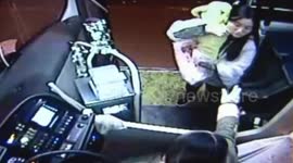 Woman carrying 'dog dressed as baby' kicked off China bus