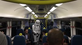 'Homeless' Stormtrooper asks for change on London train