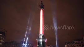 Nelson's Column in London transformed in to giant Lightsaber