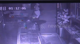 CCTV captures burglar breaking into jewellery store from ceiling