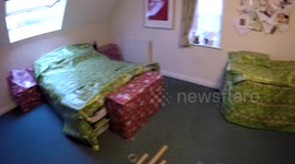 RAW Woman pranks boyfriend with wrapped apartment