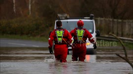 Stranded Vehicle On Section Of Flooded Road