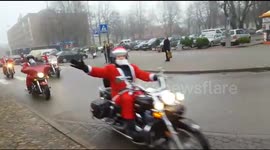 Santa Claus bikers tear through the streets of Latvian city
