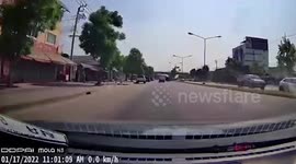 Wooden plank splinters after flying from moving car's roof in Thailand