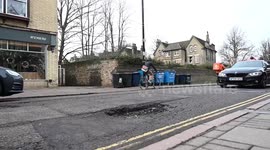 UK blighted by potholes after Christmas freeze damages roads