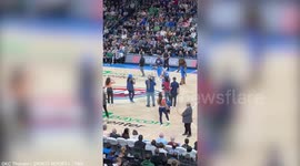Basketball fan hits half-court shot to win $20,000