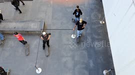 Urban skaters at the door of Barcelona Museum of Contemporary Art