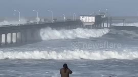 Devastating 'bomb cyclone' storm causes enormous waves to crash on San Diego pier
