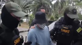 Police arrest tuxedo-wearing amateur marksman over 'murder' of British pensioner in Thailand