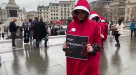 Women wearing Handmaid’s Tale costumes stage protest in London against executions in Iran