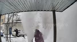 'Avalanche' falls from house roof hitting people in Russia