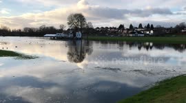 UK: Footage shows the River Severn bursts its banks in Worcester as residents brace for more flooding