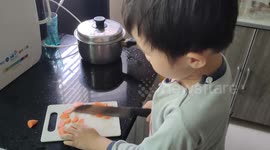 Mom's little helper in kitchen