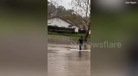 Man in Santa Barbara County seen using paddleboard as flash floods prompt mandatory evacuations