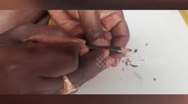 Miniature artist from eastern India sculpts Hockey World Cup trophy out of pencil lead, makes trophy replica inside glass bottle