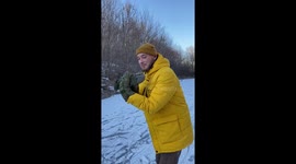 Guy acting cocky while skating on frozen river experiences a THUDDING fall