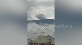 Smoke plume hangs over Mount Marapi volcano in Indonesia after eruption
