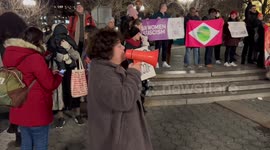Woman making speech at Stand with Democracy in Brazil rally in New York, NY, USA