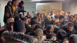 Palestinian mourners gather arround the body of Ahmed Amer Salim Abu Junaid, who succumbed to his wounds after he was shot earlier during clashes when Israeli troops raided the Balata refugee camp