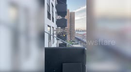 Funny woman spots neighbour’s dog spying on her through perfectly-shaped hole on balcony