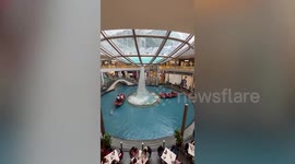 Spectacular rain collector fascinates mall-goers with whirlpool effect in Singapore