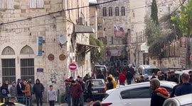 Palestinians inspect a restaurant destroyed by the Israeli forces  during a military raid