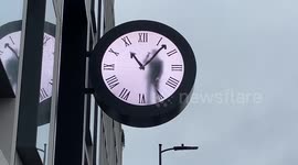 Man 'trapped' inside clock next to Paddington Station in unique art stunt