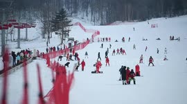 Skiers Ski At Beidahu Ski Resort in Jilin, China
