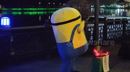Cute minion dancing on street at Malaysia