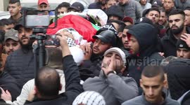 Palestinians clash with Israeli forces following funeral of father shot during raid
