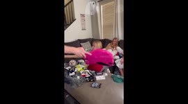 Little rockstar is left misty-eyed after parents surprise her with a guitar