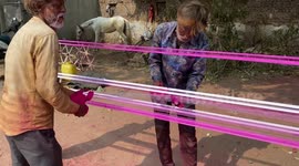 Dyeing the cord: Preparations in the streets of Ahmedabad, India for the International Kite Festival.