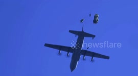 US Air Forces And Japanese Defence Forces Team Up For 2023 New Year's Jump In Narashino, Japan
