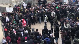 Mourners carry the bodies of two Palestinians who were killed during an Israeli raid, during their funeral, in the  West Bank city of Jenin