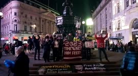 Julian Assange protest in central London, demonstrators at piccadilly circus to demand the end of prosecution of of the Australian activist
